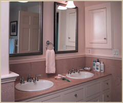 Master bathroom vanity, with period detailing and custom-made face frame cabinets.