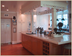 The kitchen island, with period cabinetry and  detailing.