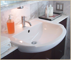 The semi-recessed sink allows for a narrow-depth counter.