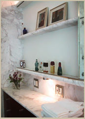 Marble shelves, with a sliding mirror, for small item display.