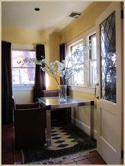 A new doorway was created to the breakfast room.  The leaded-glass French doors were purchased from a reclamation yard and renovated.
