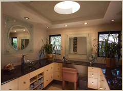 The vanity room features a circular light monitor and plenty of storage space.