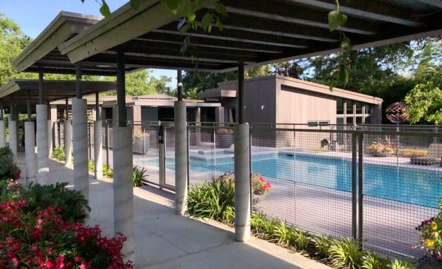covered walkway with concrete collars