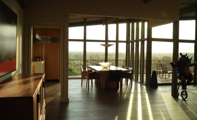 living and dining area overlooking the river parkway